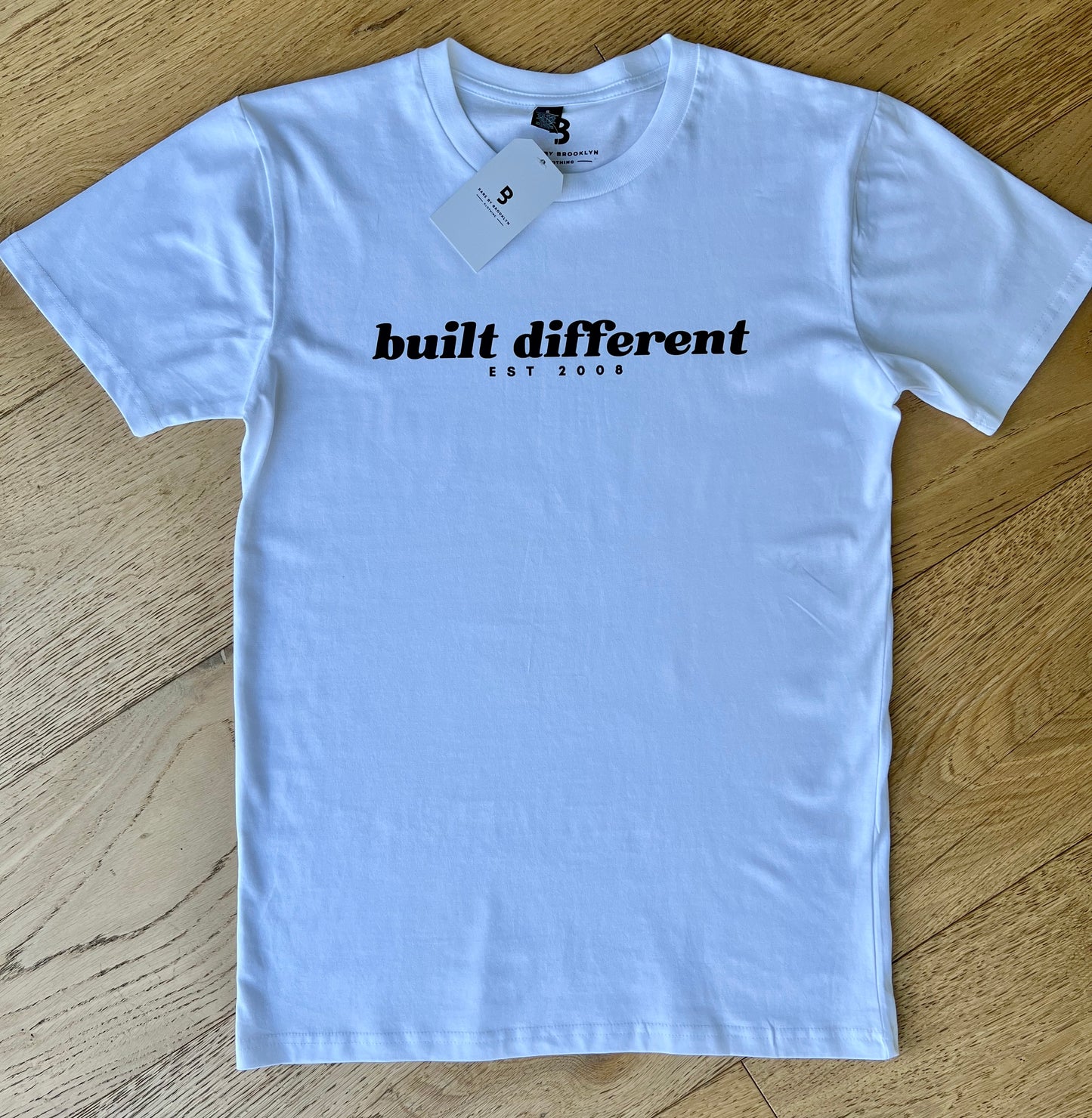 Oscar Built Different Men's Tee